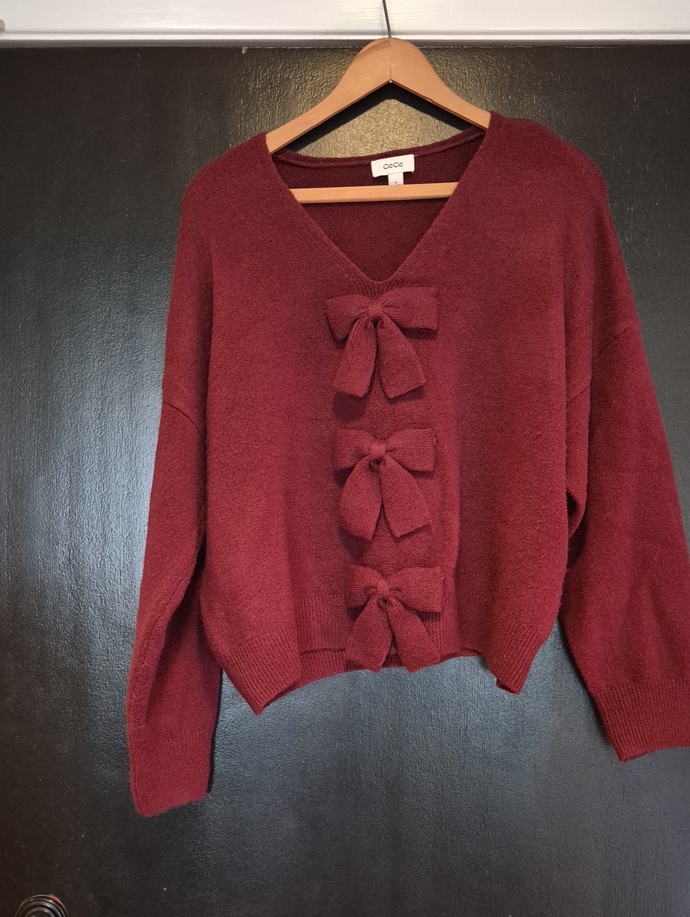 CeCe Wine Red V-Neck Sweater with Front Bows